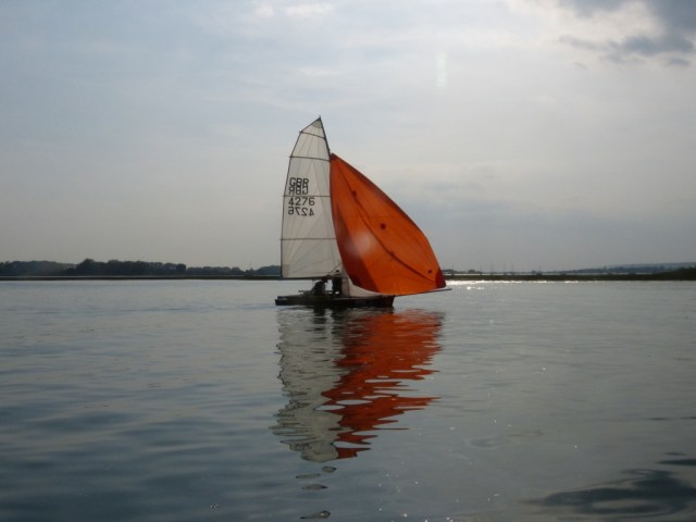 Sailing home as the sun sets
