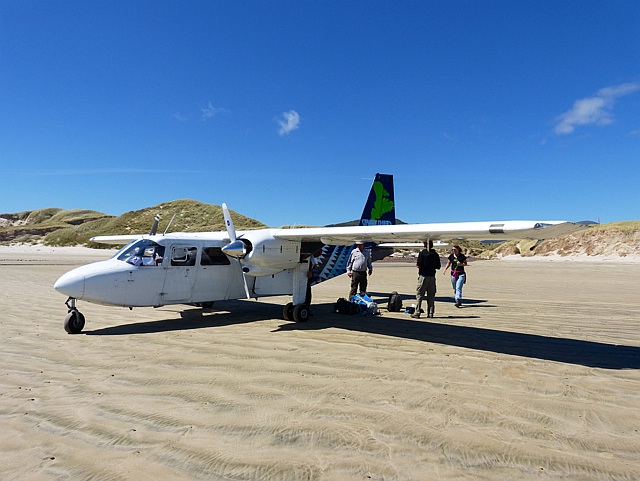 Saying bye to the captain and the other 3 passengers on the plane